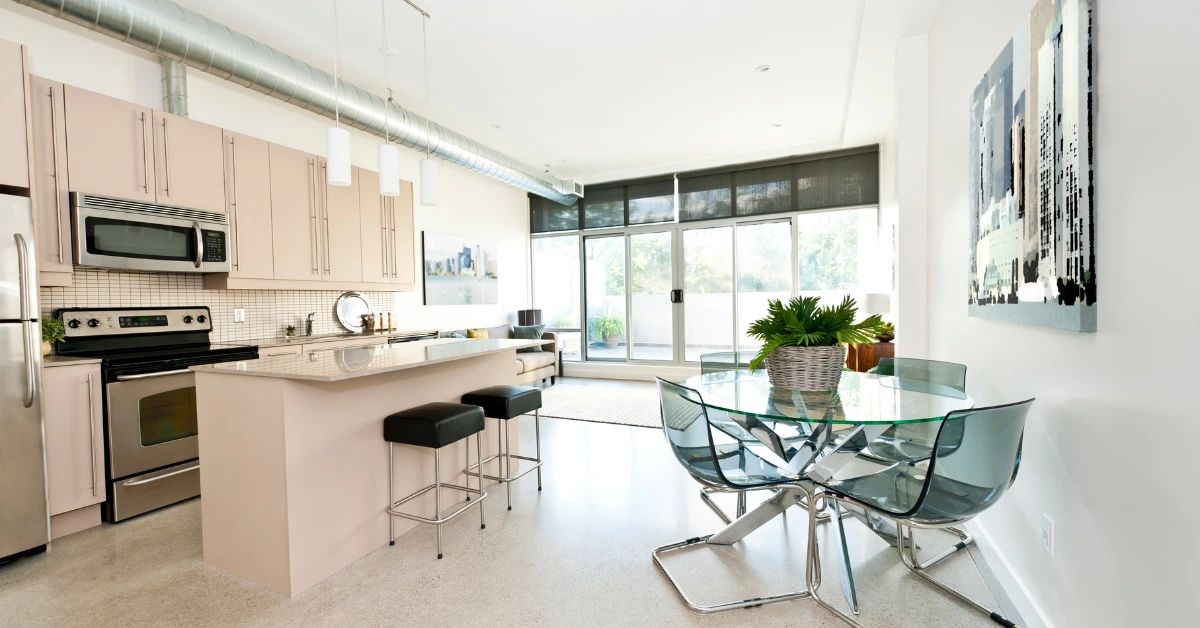 Professional condo cleaning service leaves a kitchen spotless and organized.